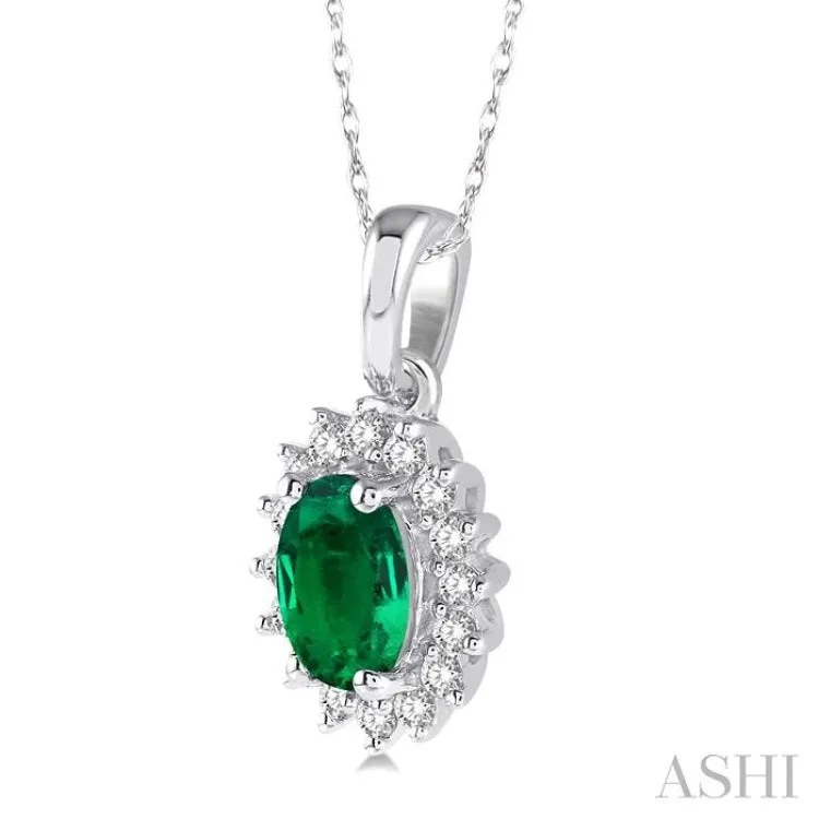 1/8 Ctw Round Cut Diamond and Oval Cut 6x4mm Emerald Center Sunflower Precious Pendant in 10K White Gold with chain