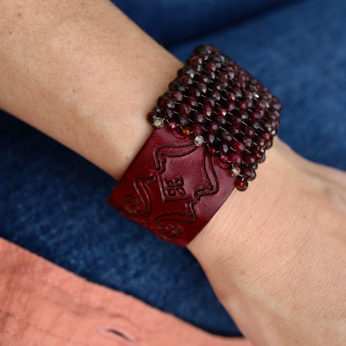 Hand Stitched Red Garnet on Carved Burgundy Leather Bracelet